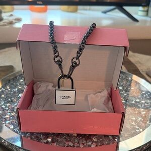 CHANEL beaute Black Chain Necklace with White Padlock Pendant